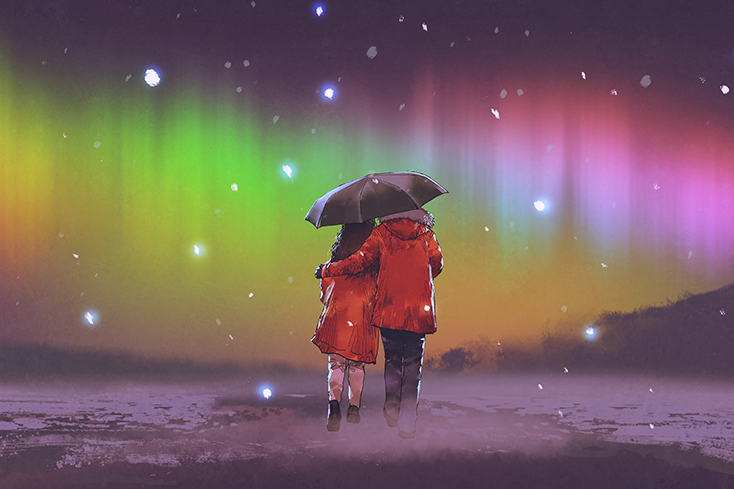 two people under umbrella looking at stars
