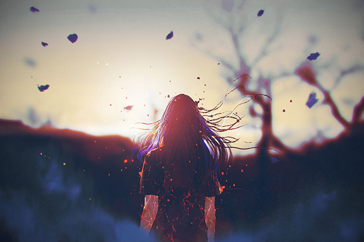 rear view of woman with cracked effect on her body looking at sunrise