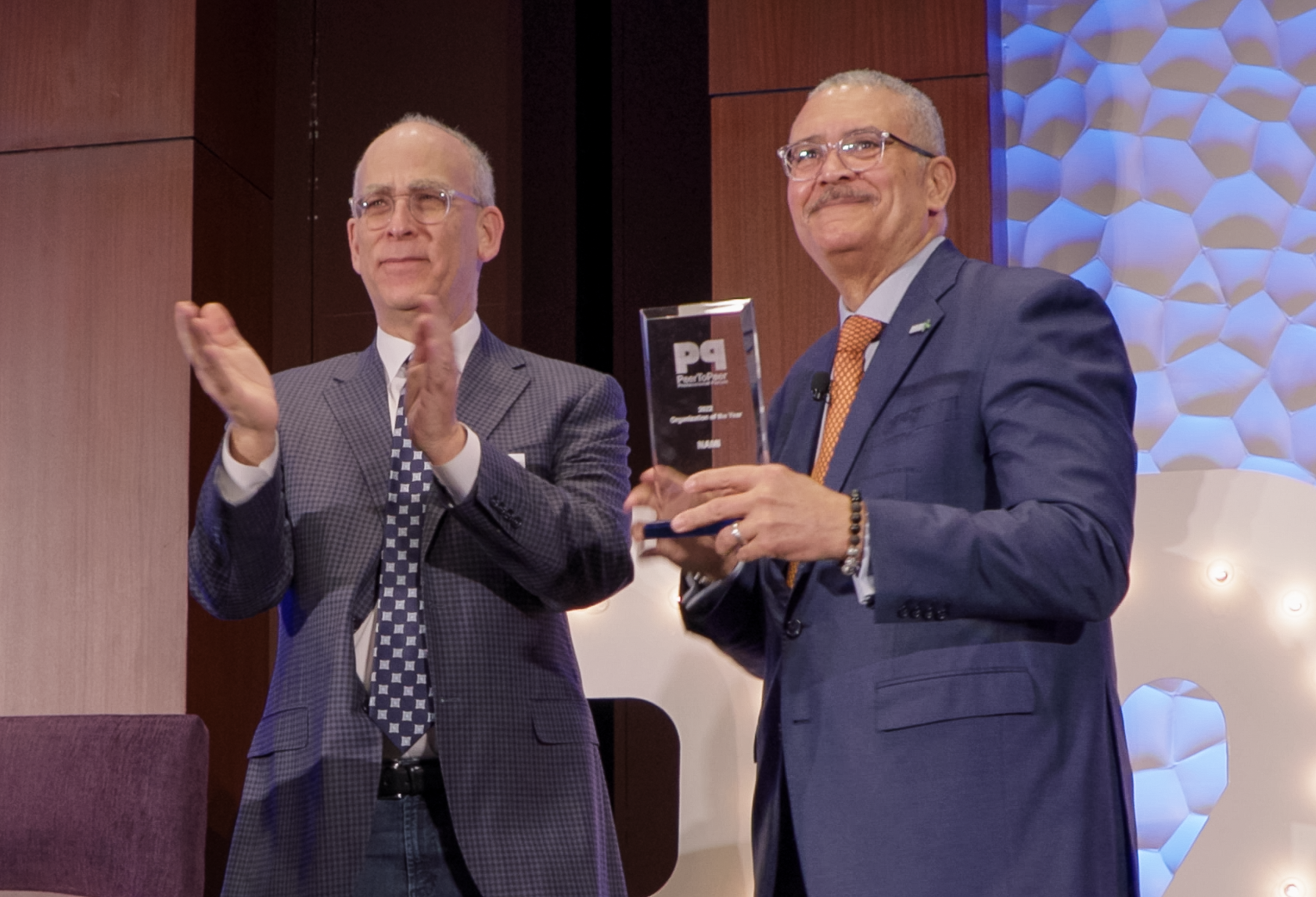 Daniel H. Gillison accepts the P2P award from David Hessekiel